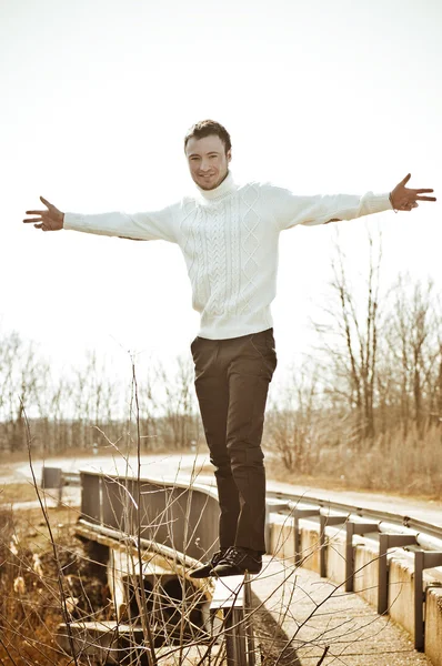 Beautiful man in fashionable clothes outdoors. Fashion portrait — Stock Photo, Image