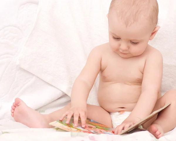 Sweet little baby with book — Stock Photo, Image
