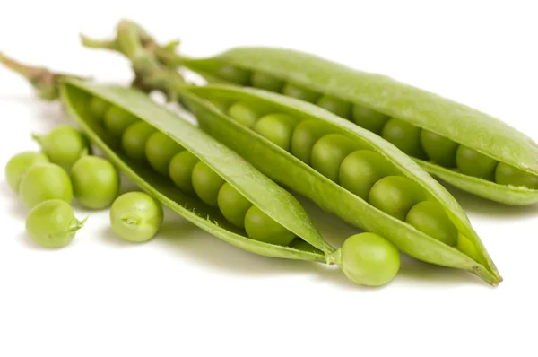 Fresh green peas on white background — Stock Photo, Image