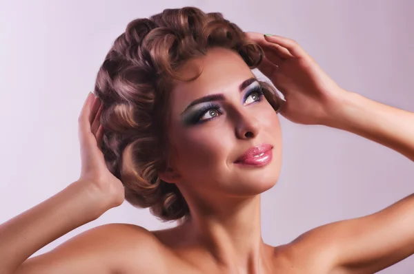 Portrait of beautiful young woman with makeup — Stock Photo, Image