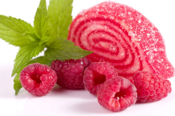 Tasty jelly candy with raspberry on the white — Stock Photo, Image