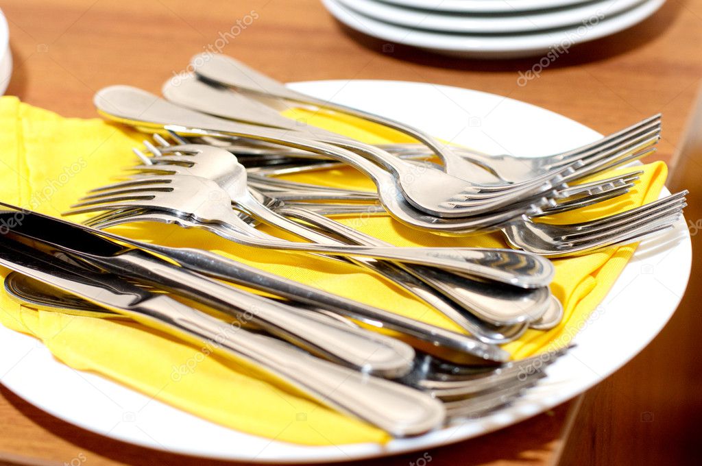 Forks and knifes on the plate