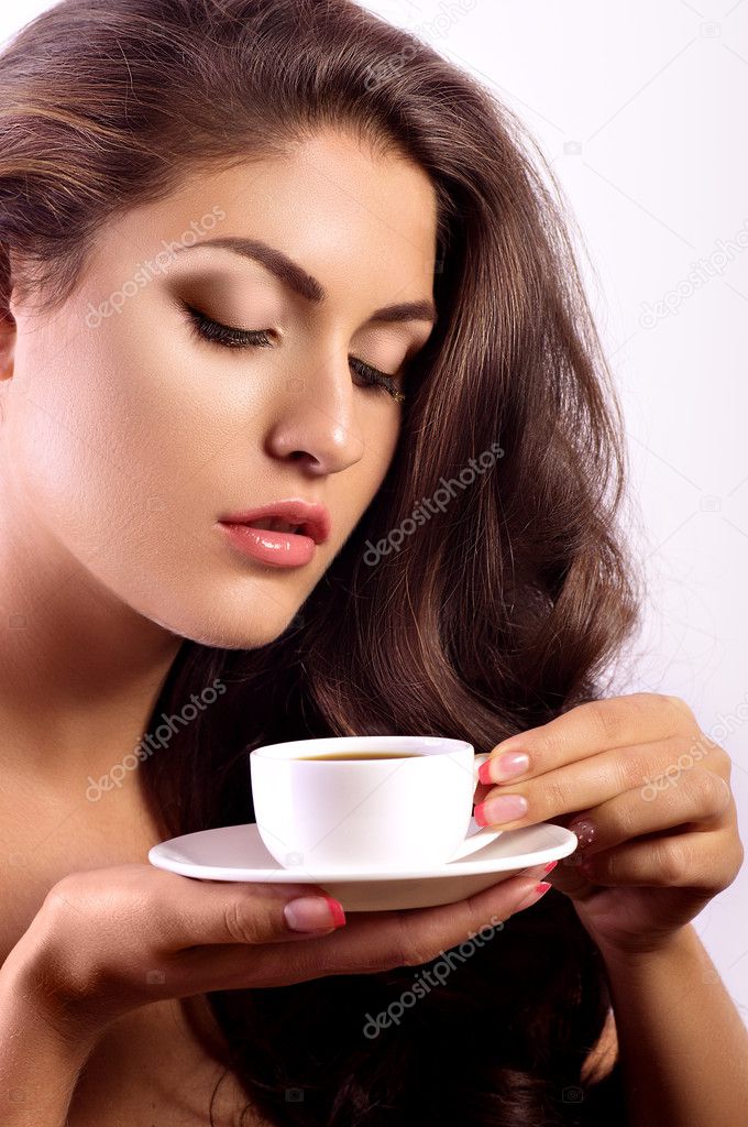 Woman with coffee cup.