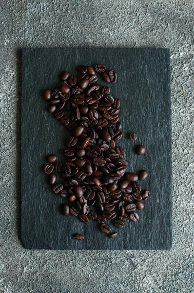 Coffee Beans Served Slate Board Gray Background Top View — Zdjęcie stockowe