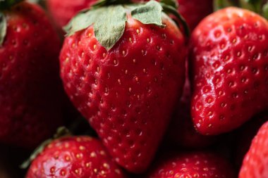 Fresh ripe strawberry, close up, selective focus.