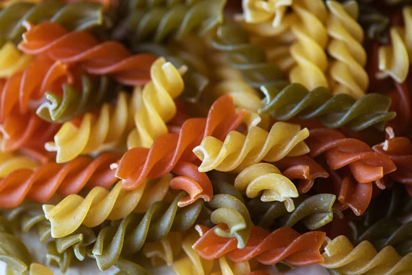 Fusilli Colorful Twisted Pasta Background — Zdjęcie stockowe