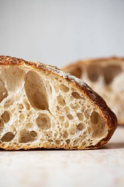 Slice of homemade sourdough bread. Close up.