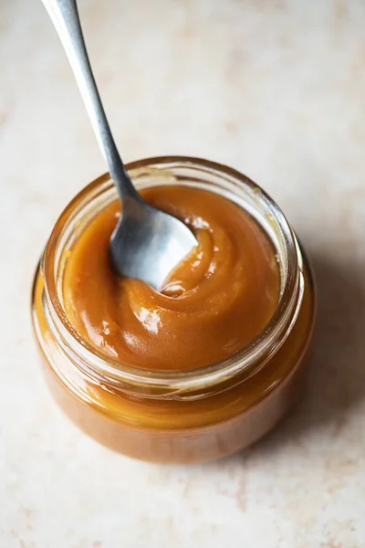 Homemade Creamy Caramel Jar Close — Fotografia de Stock