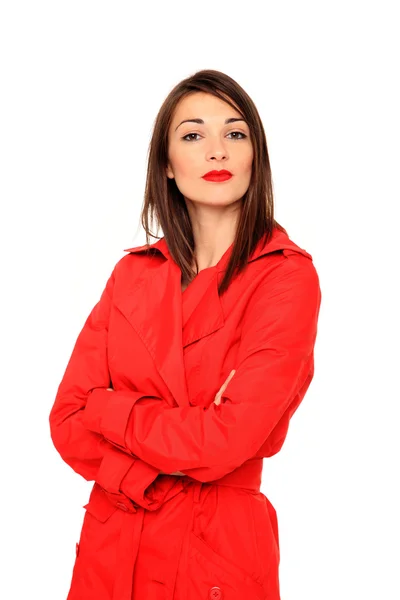 Beautiful girl on a red coat — Stock Photo, Image