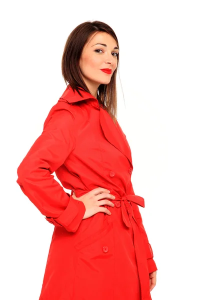 Beautiful girl on a red coat — Stock Photo, Image