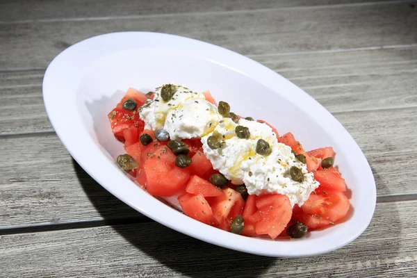 Tomato salad with cream cheese — Stock Photo, Image