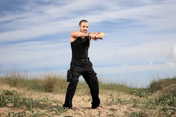 Homem com arma — Fotografia de Stock