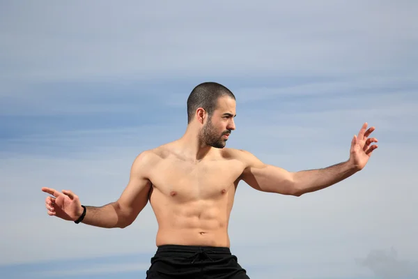 Kick boxer practising outside — Stock Photo, Image