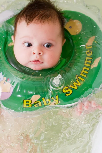 Bathing baby Stock Photo