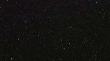 Işığın yanıp sönen renkli noktalarının hareket eden arkaplanı