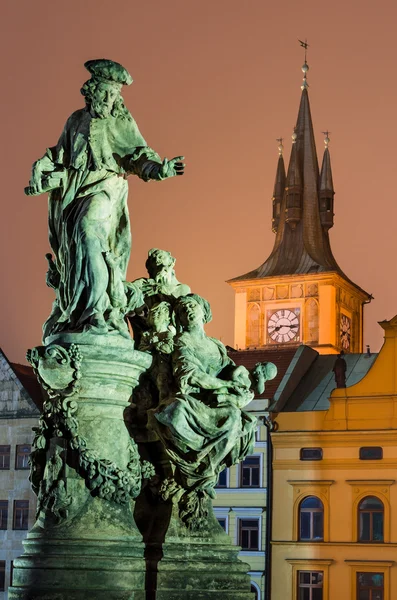 Saint Ivo statue and Smetana clock-tower, Prague. — Stock Photo, Image