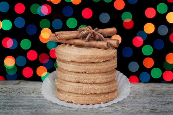 A stack of Christmas cookies, cinnamon and anise on the backgrou — Stock Photo, Image