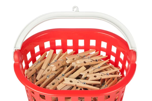 Set of clothespins in the red basket. Closeup. — Stock Photo, Image