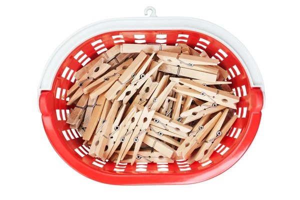Clothespins in red basket. View from above. Closeup. – stockfoto