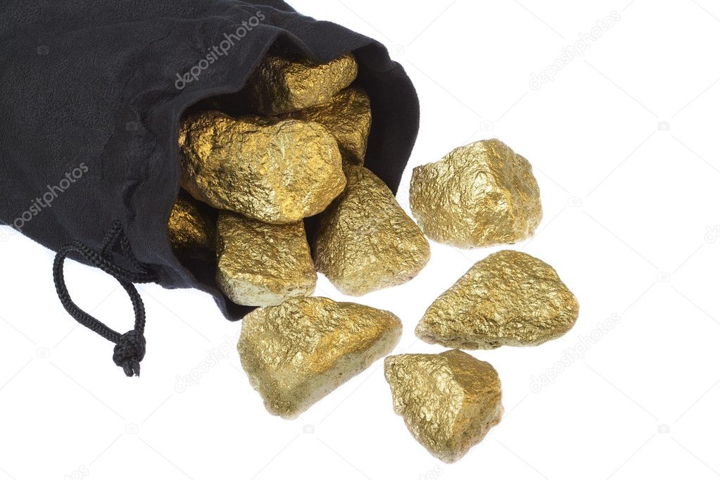 Gold nuggets scattered stones in a bag on a white background.