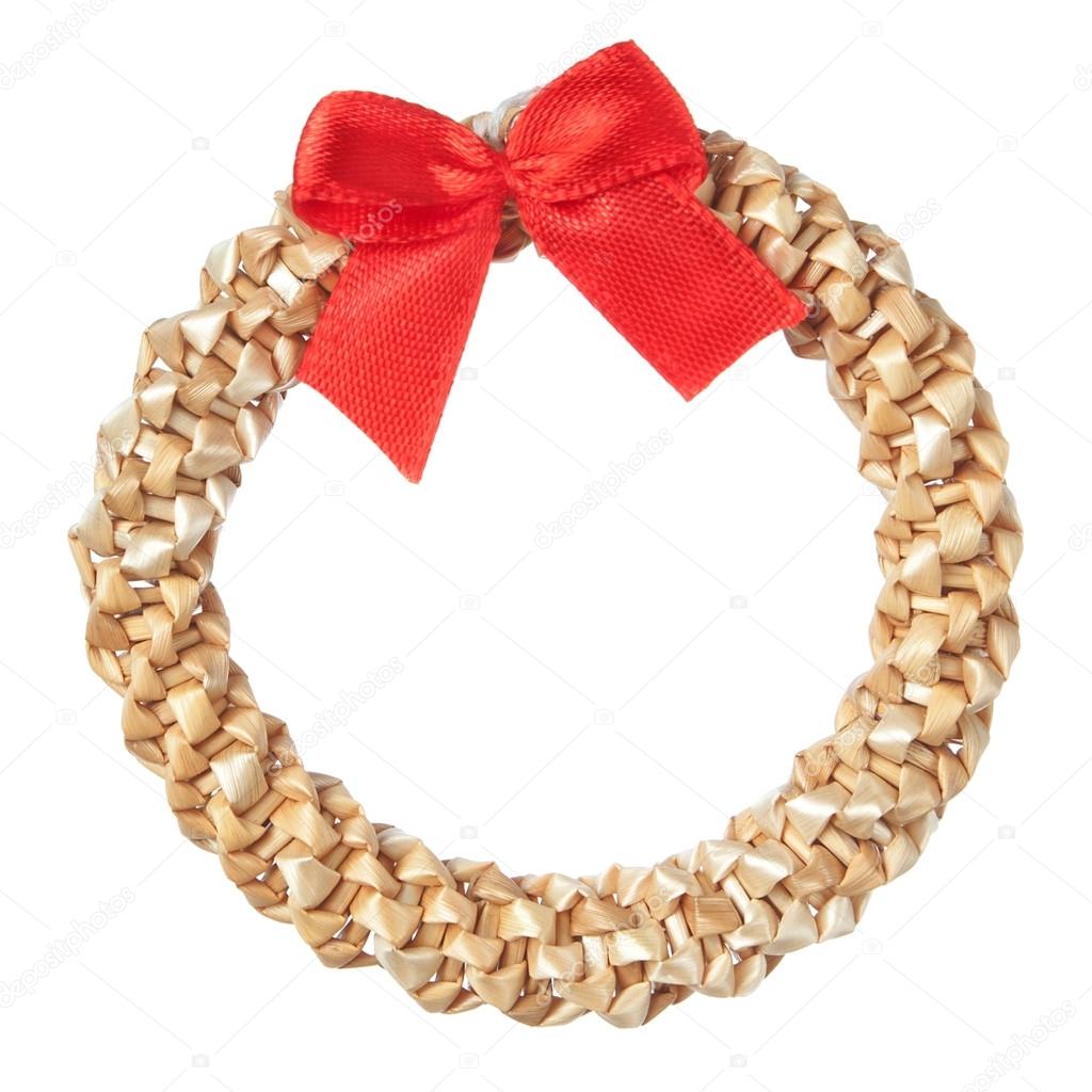 Straw decorative Christmas wreath and red bow.