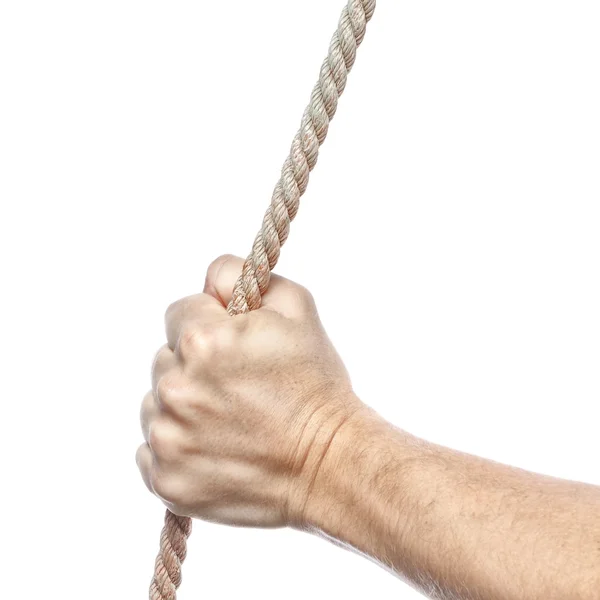 Hand holds a thick rope. On a white background. — Stock Photo, Image