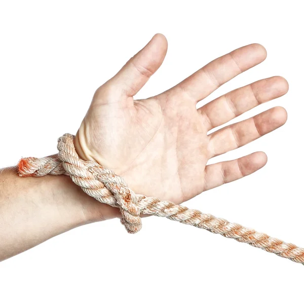 Mannes Hand gebunden Einschränkung mit einem Seil. auf weißem Hintergrund. — Stockfoto