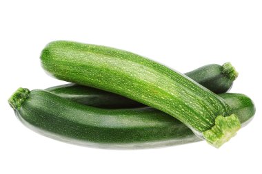 beyaz zemin üzerinde bir yığın halinde üç sebze kabak.