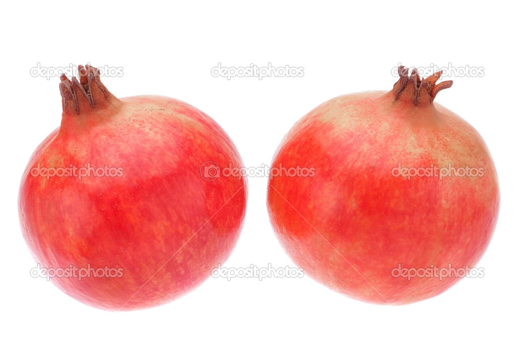 Two fruit pomegranate on a white background. Close-up.