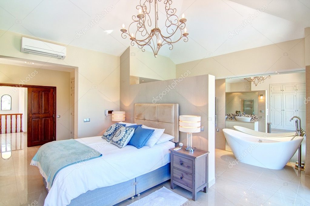 Bedroom with furniture and decorative bathroom.