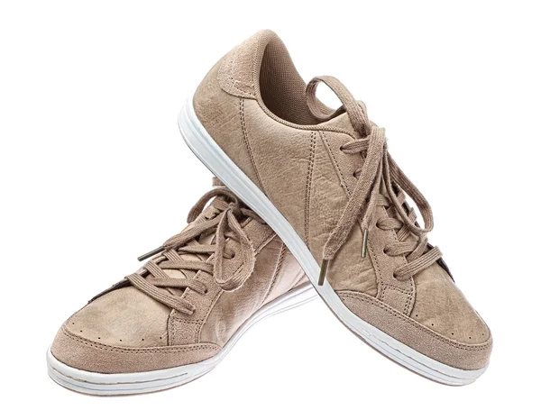 Jeunesse sport chaussures marron. sur un fond blanc. — Photo