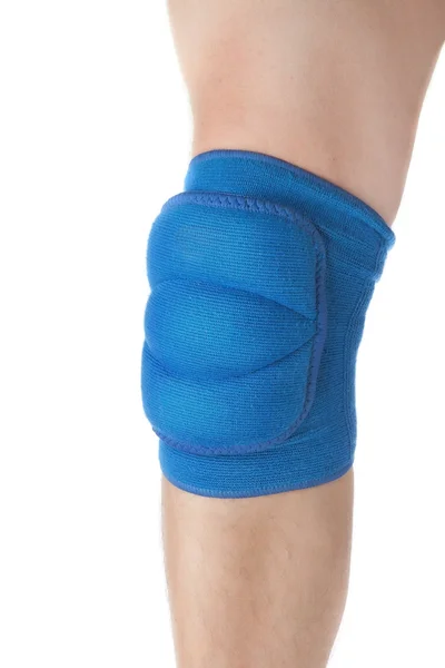 Knee protection in games on the male leg. Close-up. On a white b Stock Picture
