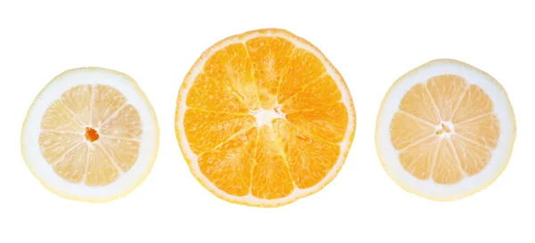 Fresh lemons and oranges in the cut. On a white background. — Stock Photo, Image