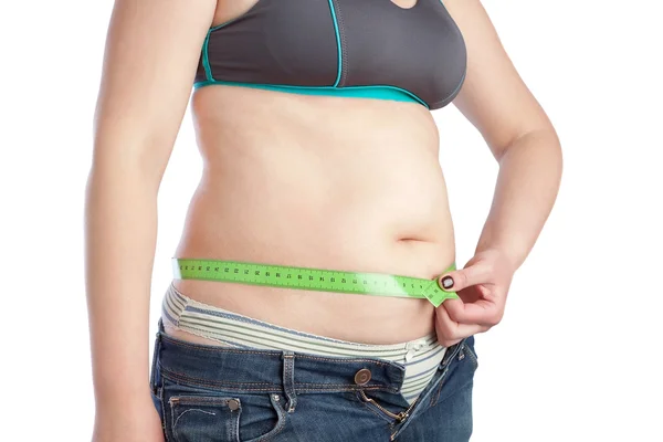 Mujer de mediana edad grasa midiendo la cintura. bac aisladas en blanco — Foto de Stock