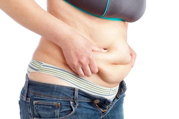 Gruba kobieta, pomiar brzucha warstwa tłuszczu. na białym tle. — Zdjęcie stockowe