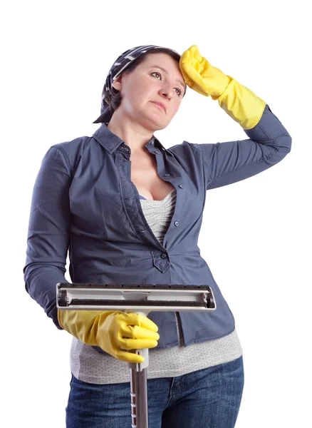 Tired and exhausted after a middle-aged housewife, cleaning the — Stock Photo, Image