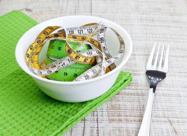 Plate and measuring meter, concept of weight loss. — Stock Photo, Image
