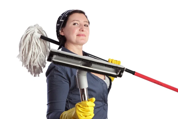 Cheerful woman housewife with vacuum cleaner and cleaning equipm — Stock Photo, Image