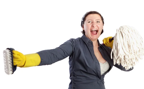 A woman with a mop screams dissatisfied housewife. — Stock Photo, Image