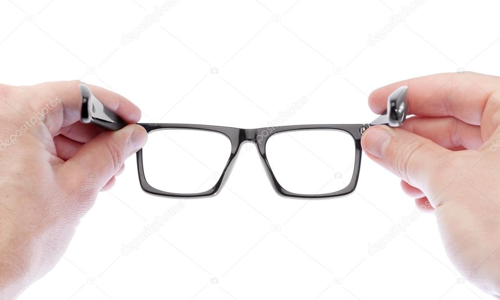 A man wearing glasses to improve vision. On a white background.