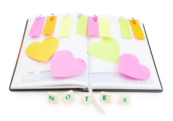 Notebook office organizer and reminder stickers with a ballpoint — Stock Photo, Image