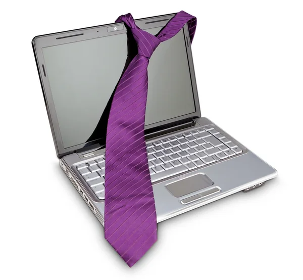Elegant necktie on a laptop computer as a symbol of fashion. On — Stock Photo, Image