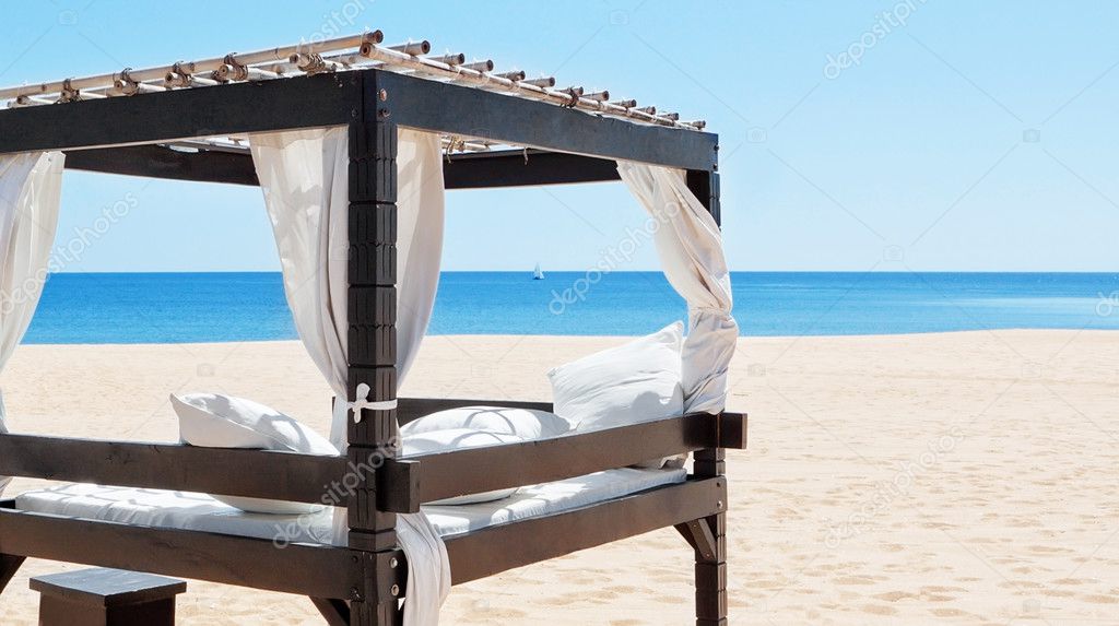Luxurious bed by the sea, the beach to relax on vacation. Portug