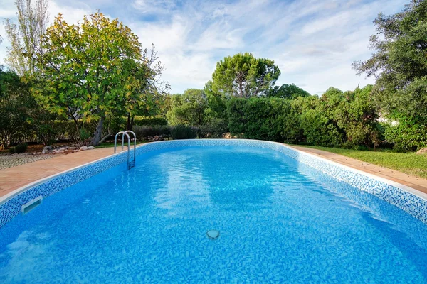 Luxury summer swimming pool. For relaxation and swimming. Summer — Stock Photo, Image