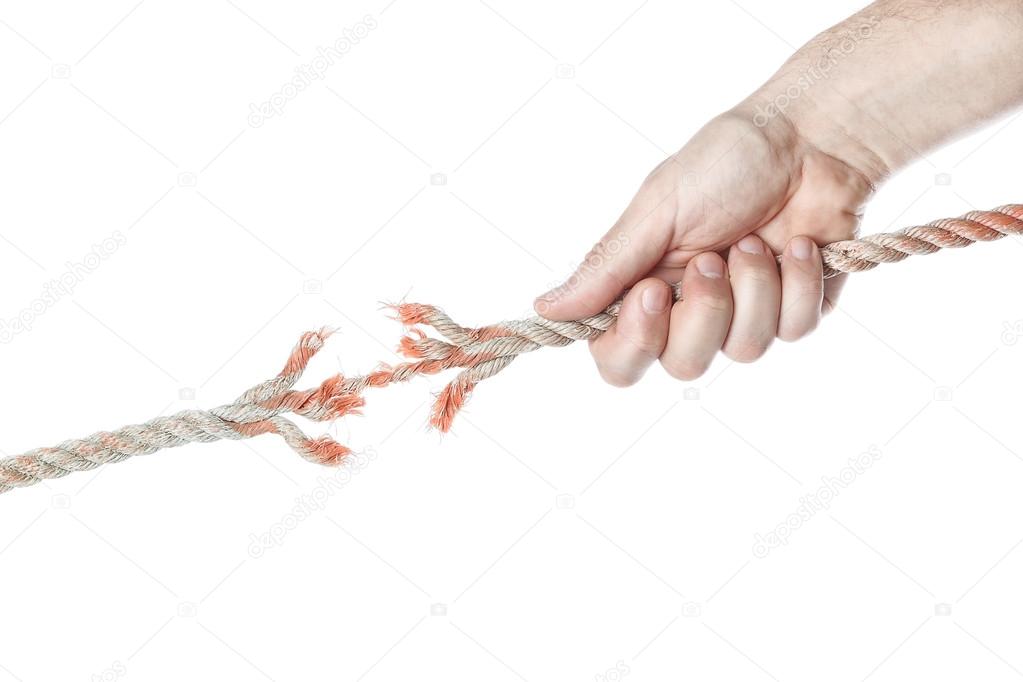 Man's hand pulls the rope and breaks. On a white background.