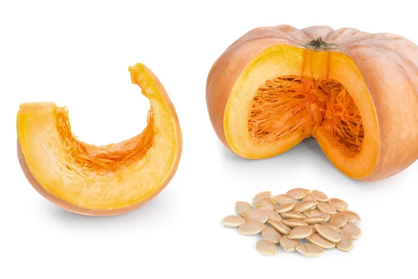 Cut pieces of pumpkin soup and slices and seeds. On a white background. — Stock Photo, Image