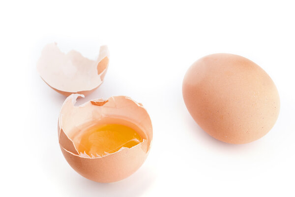 Broken egg with an open shell. On a white background.