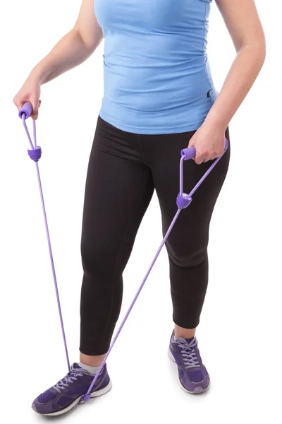 Middelbare leeftijd vrouw beoefenen fitness Expander. op een witte achtergrond. — Stockfoto