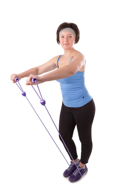 Frau Fitnessturnen zu tun. für die Gesundheit. — Stockfoto