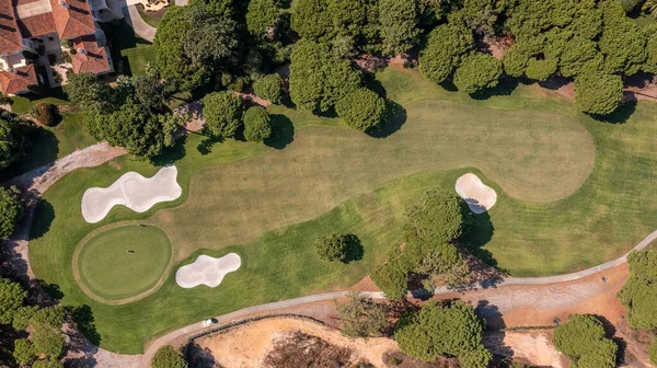 Golf course beautiful Aerial view of golf field landscape with sunrise view in the morning shot. Portugal, Algarve